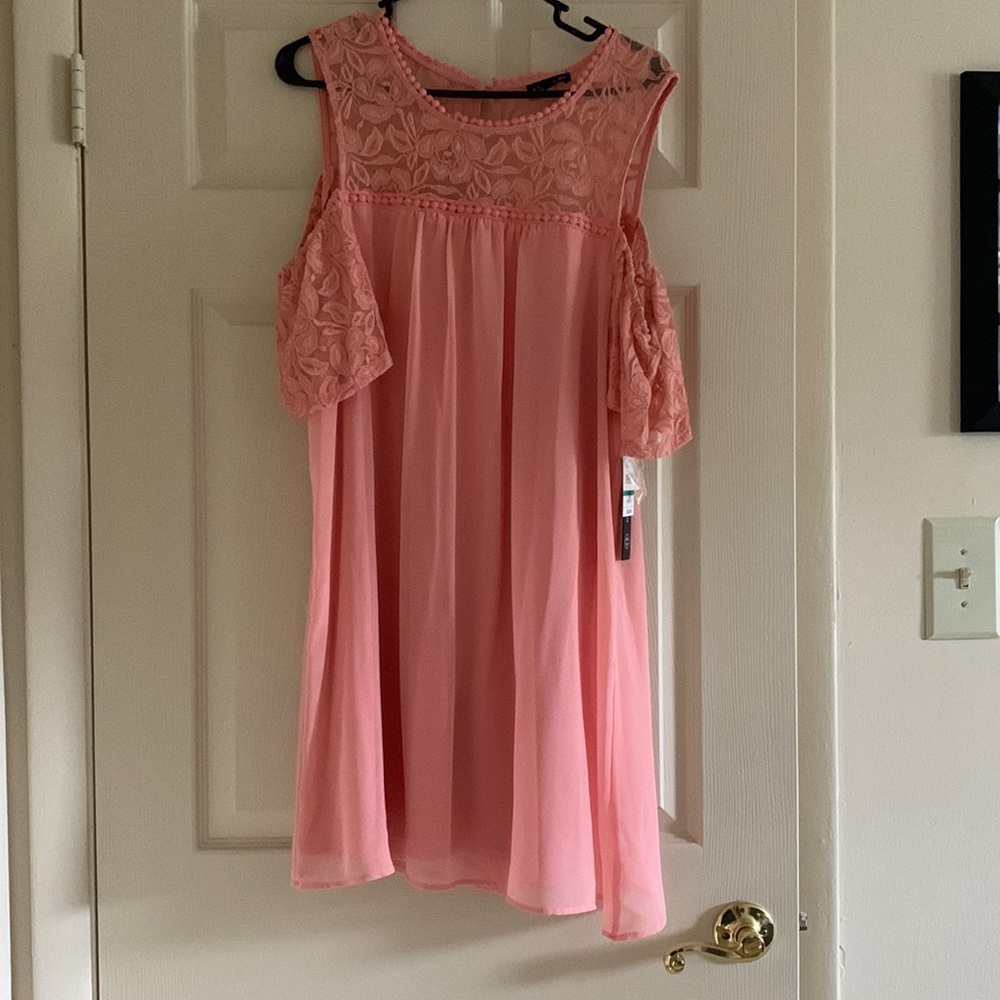 Brand is As you wish, this pink dress is a XL and is brand new and never worn.